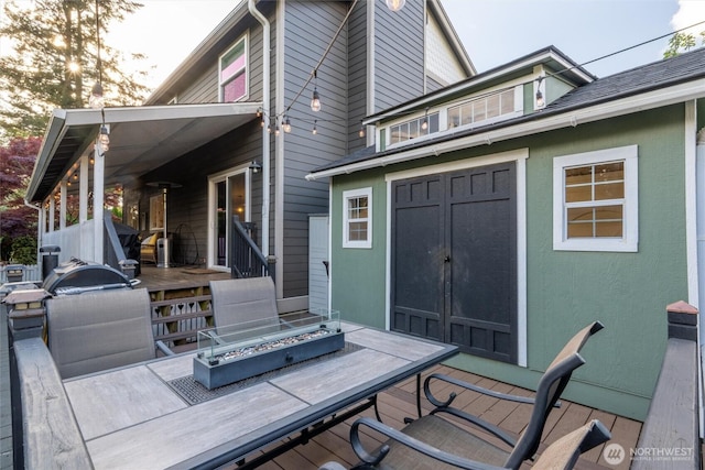4279 H Street Rd, Blaine, WA 98230 - wooden deck with a fire pit