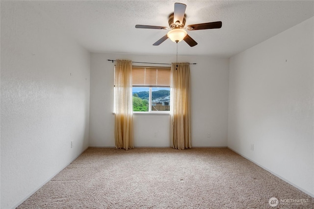 211 Blake St, Enumclaw, WA 98022 - carpeted empty room with ceiling fan and a textured ceiling