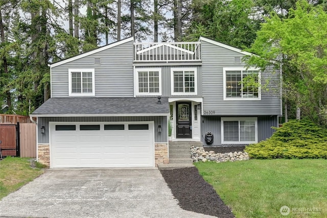 26309 187th Ct SE, Covington, WA 98042 - view of front of house featuring stone siding, concrete driveway, an attached garage, and board and batten siding