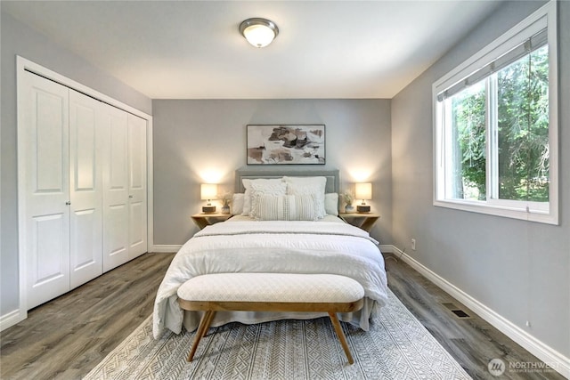 26309 187th Ct SE, Covington, WA 98042 - bedroom with baseboards, wood finished floors, and a closet