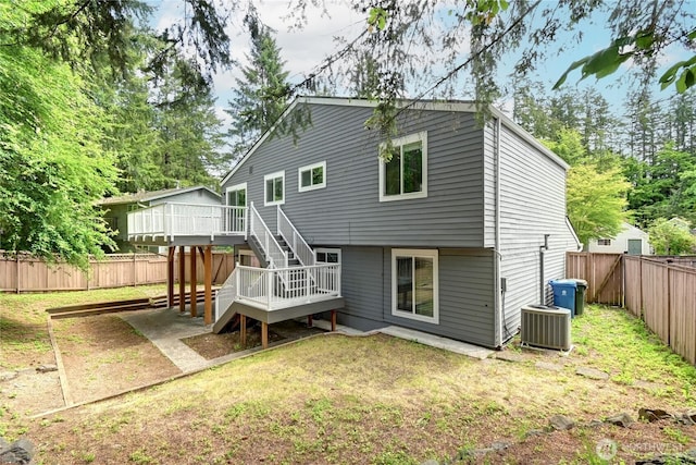 26309 187th Ct SE, Covington, WA 98042 - back of house featuring central AC unit, stairs, and a deck