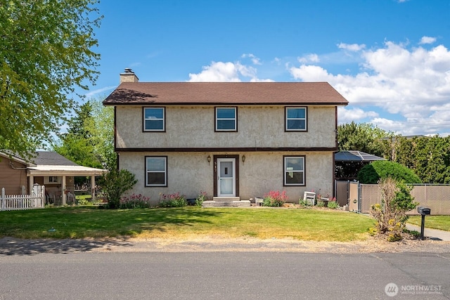 517 Marginal Way, Quincy, WA 98848 - view of front of house with stucco siding and a chimney