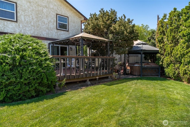 517 Marginal Way, Quincy, WA 98848 - view of grassy yard featuring a gazebo, a hot tub, and a wooden deck