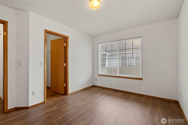 1114 Sinclair Way Unit 63, Burlington, WA 98233 - empty room featuring baseboards and wood finished floors