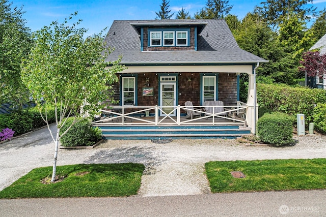 251 Meriweather St, Pacific Beach, WA 98571 - view of front facade with a porch and roof with shingles