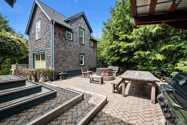 251 Meriweather St, Pacific Beach, WA 98571 - view of patio with a fire pit and grilling area