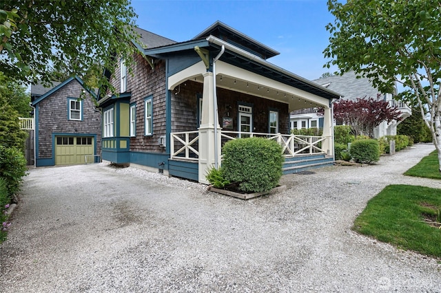 251 Meriweather St, Pacific Beach, WA 98571 - view of front of house with covered porch, a garage, and driveway