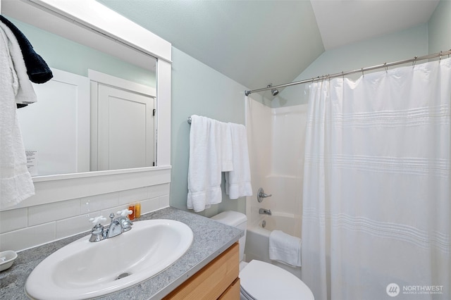251 Meriweather St, Pacific Beach, WA 98571 - full bath featuring backsplash, lofted ceiling, toilet, vanity, and shower / bath combo