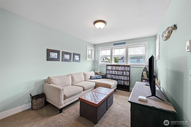 251 Meriweather St, Pacific Beach, WA 98571 - carpeted living area featuring baseboards