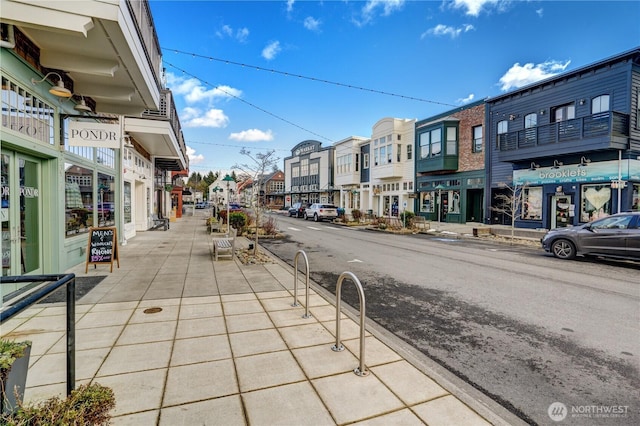 251 Meriweather St, Pacific Beach, WA 98571 - view of asphalt road featuring sidewalks, curbs, and a residential view