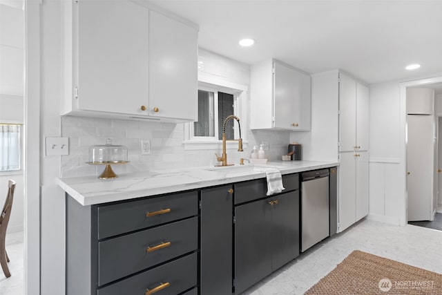 6709 E I St, Tacoma, WA 98404 - kitchen featuring a sink, white cabinetry, stainless steel dishwasher, decorative backsplash, and recessed lighting