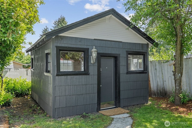 6709 E I St, Tacoma, WA 98404 - view of outbuilding with fence and an outbuilding