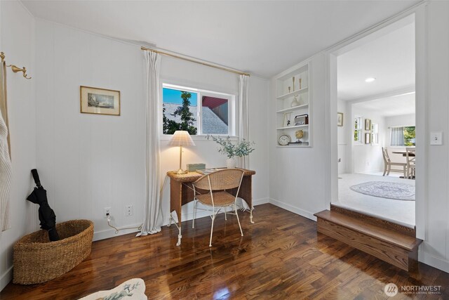 6709 E I St, Tacoma, WA 98404 - office area with wood finished floors, built in shelves, and baseboards