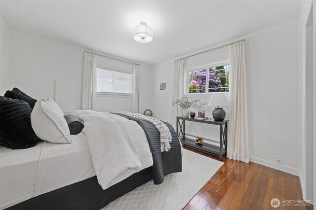 6709 E I St, Tacoma, WA 98404 - bedroom with multiple windows, dark wood finished floors, and baseboards