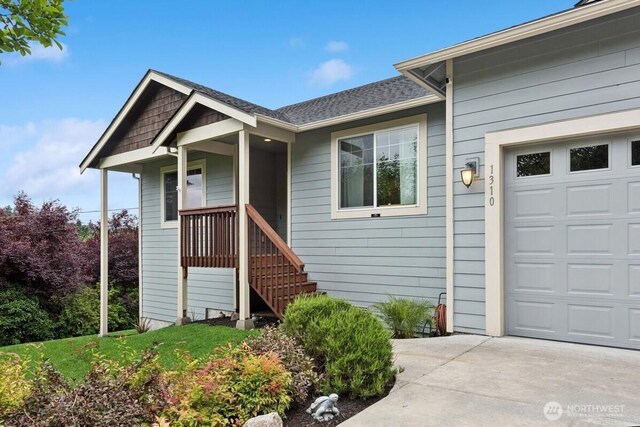 1310 Maple Ave, Snohomish, WA 98290 - entrance to property featuring a garage, driveway, and a shingled roof