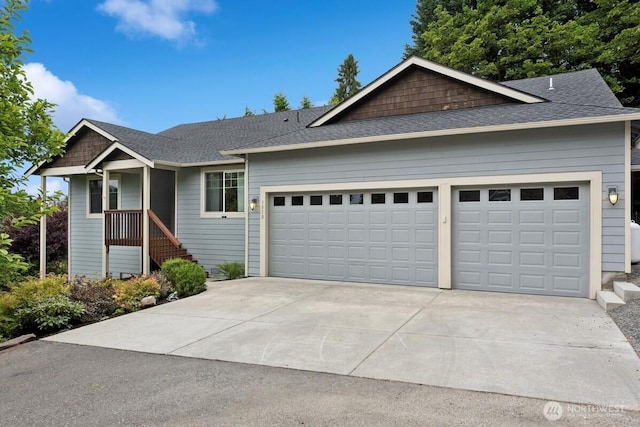 1310 Maple Ave, Snohomish, WA 98290 - view of front of house with a garage, concrete driveway, and a shingled roof