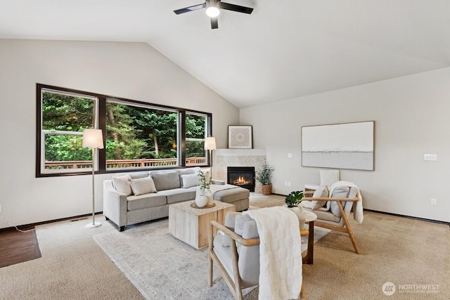 1310 Maple Ave, Snohomish, WA 98290 - living area featuring a fireplace, a ceiling fan, lofted ceiling, light colored carpet, and healthy amount of natural light