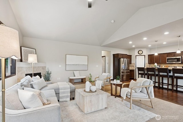 1310 Maple Ave, Snohomish, WA 98290 - living area featuring a fireplace, recessed lighting, a ceiling fan, and high vaulted ceiling