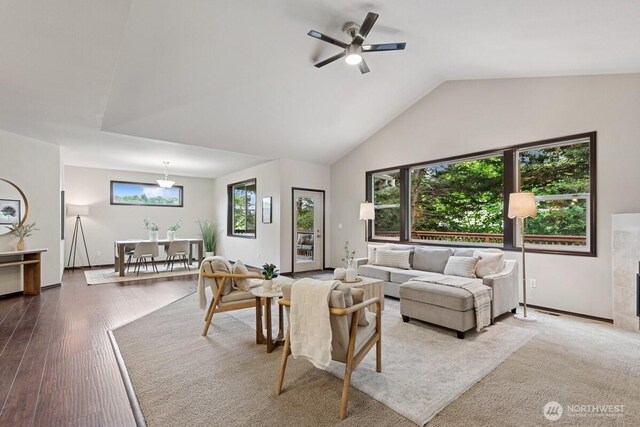 1310 Maple Ave, Snohomish, WA 98290 - living room featuring a ceiling fan, vaulted ceiling, and wood finished floors