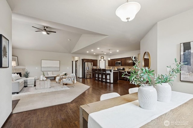1310 Maple Ave, Snohomish, WA 98290 - living area with vaulted ceiling, recessed lighting, dark wood-style flooring, and a ceiling fan