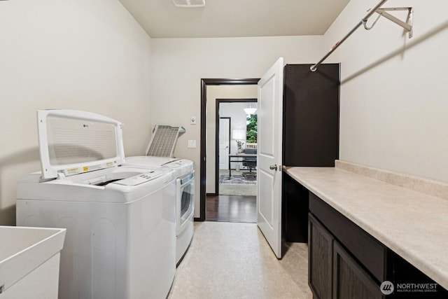 1310 Maple Ave, Snohomish, WA 98290 - laundry area featuring cabinet space and washing machine and dryer