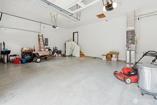 1310 Maple Ave, Snohomish, WA 98290 - garage with a garage door opener and electric panel