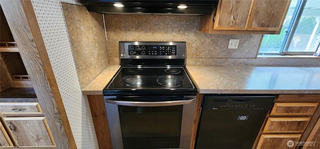 82 Marjory Ln, Sequim, WA 98382 - kitchen with electric stove, dishwasher, ventilation hood, tasteful backsplash, and light countertops