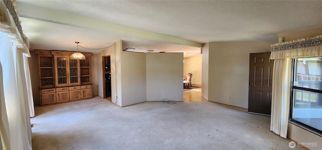 82 Marjory Ln, Sequim, WA 98382 - unfurnished living room with carpet flooring and baseboards