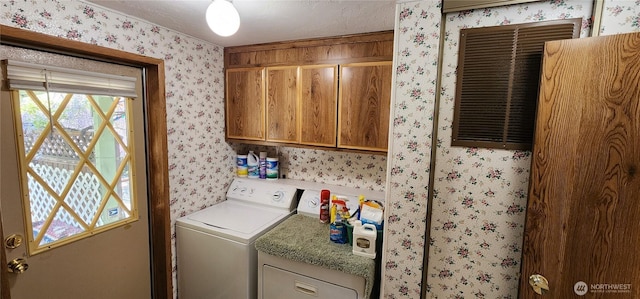 82 Marjory Ln, Sequim, WA 98382 - washroom featuring wallpapered walls, separate washer and dryer, and cabinet space
