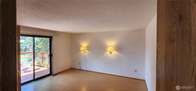 82 Marjory Ln, Sequim, WA 98382 - unfurnished room featuring light wood-style floors and a textured ceiling