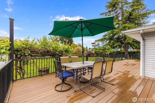 5809 162nd Ave E, Sumner, WA 98390 - wooden terrace with outdoor dining area