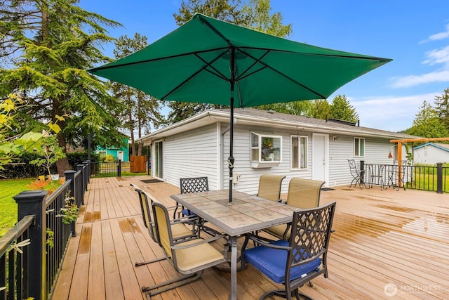 5809 162nd Ave E, Sumner, WA 98390 - wooden terrace with outdoor dining space