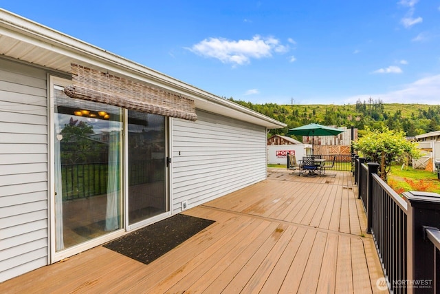 5809 162nd Ave E, Sumner, WA 98390 - wooden deck with outdoor dining area