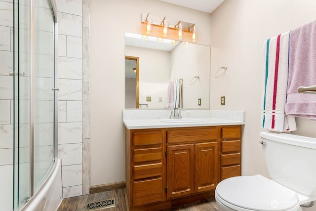5809 162nd Ave E, Sumner, WA 98390 - full bathroom with toilet, vanity, and wood finished floors