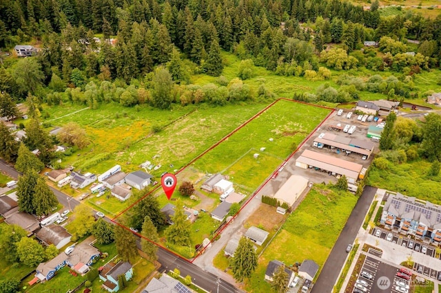 5809 162nd Ave E, Sumner, WA 98390 - aerial overview of property's location with property parcel outlined and a heavily wooded area