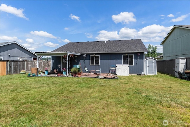 1403 Headley Ave NW, Orting, WA 98360 - back of house with a patio area and roof with shingles
