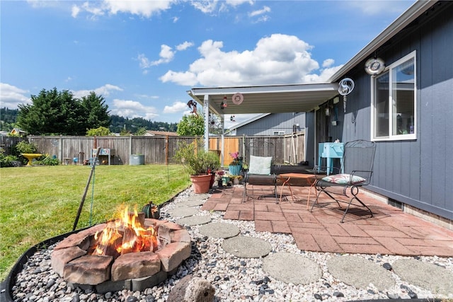 1403 Headley Ave NW, Orting, WA 98360 - view of patio with an outdoor fire pit