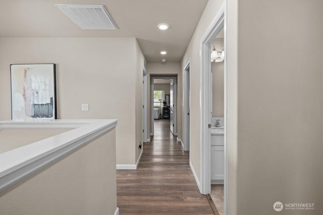 8657 Atlas Ave NE, Lacey, WA 98516 - hallway with dark wood finished floors, recessed lighting, and baseboards