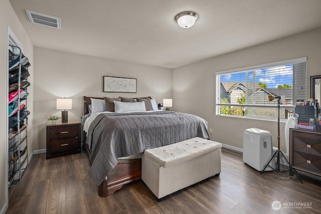 8657 Atlas Ave NE, Lacey, WA 98516 - bedroom with dark wood-type flooring and baseboards