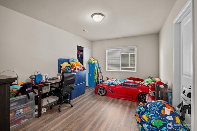 8657 Atlas Ave NE, Lacey, WA 98516 - bedroom featuring wood finished floors