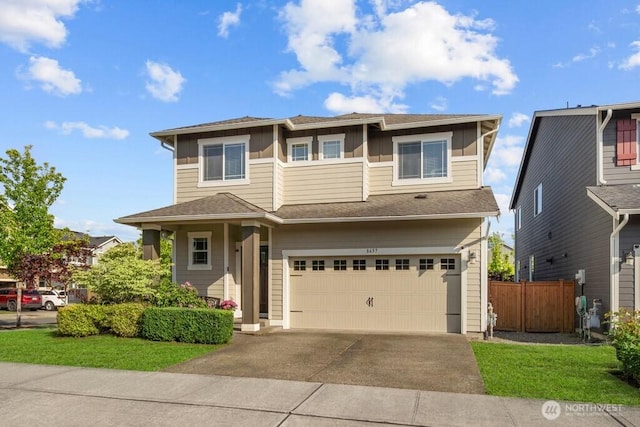 8657 Atlas Ave NE, Lacey, WA 98516 - prairie-style house with a garage, board and batten siding, and concrete driveway
