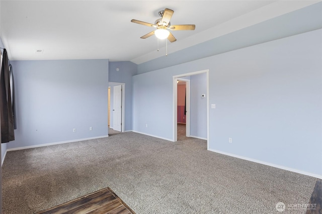600 S County Rd, Warden, WA 98857 - empty room with a ceiling fan, baseboards, dark colored carpet, and vaulted ceiling