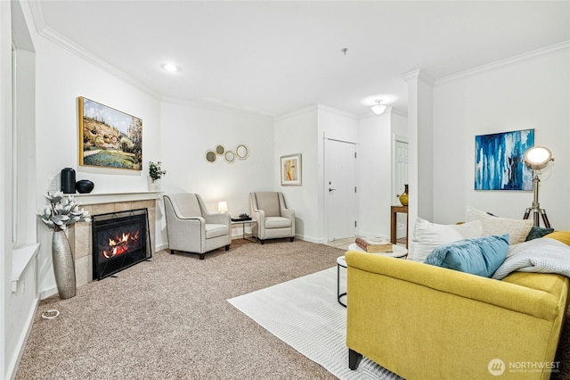 25025 SE Klahanie Blvd Unit D204, Sammamish, WA 98029 - carpeted living area with crown molding, a tiled fireplace, baseboards, and recessed lighting