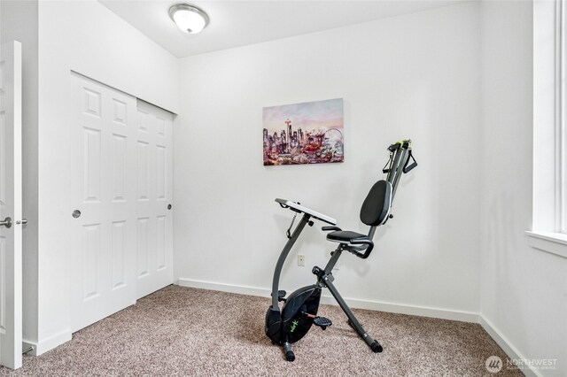 25025 SE Klahanie Blvd Unit D204, Sammamish, WA 98029 - exercise room featuring carpet floors and baseboards