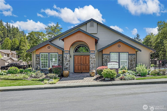 25025 SE Klahanie Blvd Unit D204, Sammamish, WA 98029 - view of front of house featuring stone siding