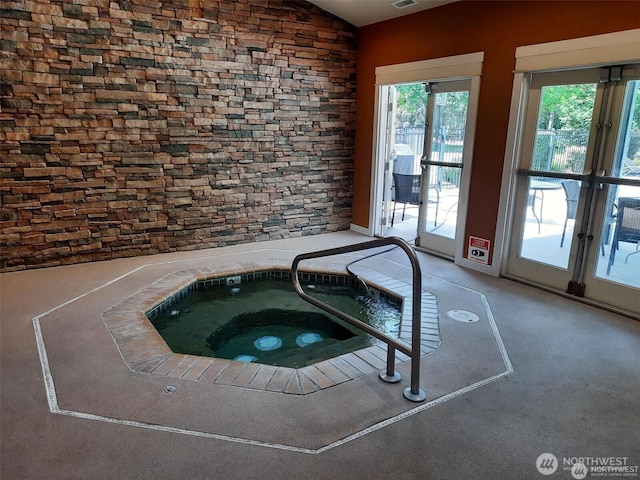 25025 SE Klahanie Blvd Unit D204, Sammamish, WA 98029 - view of pool featuring a hot tub and french doors