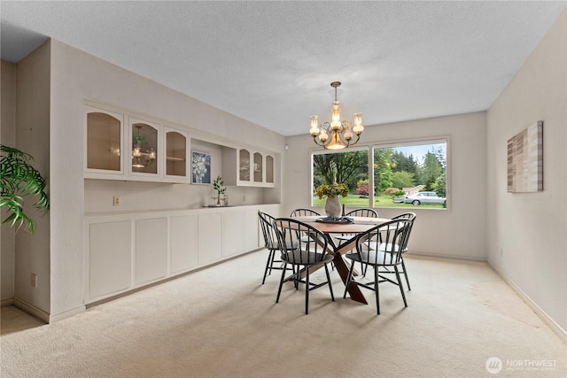 907 Baker St, Bellingham, WA 98225 - dining space with light carpet and a chandelier