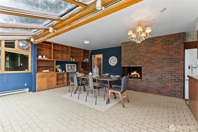 907 Baker St, Bellingham, WA 98225 - dining space with a baseboard radiator, brick patterned floors, a chandelier, brick wall, and a fireplace
