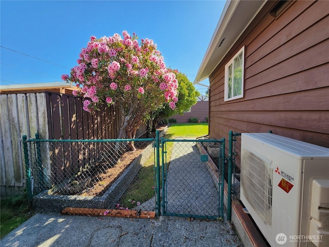 116 W 4th, Port Angeles, WA 98362 - view of home's exterior with an ac unit and a gate