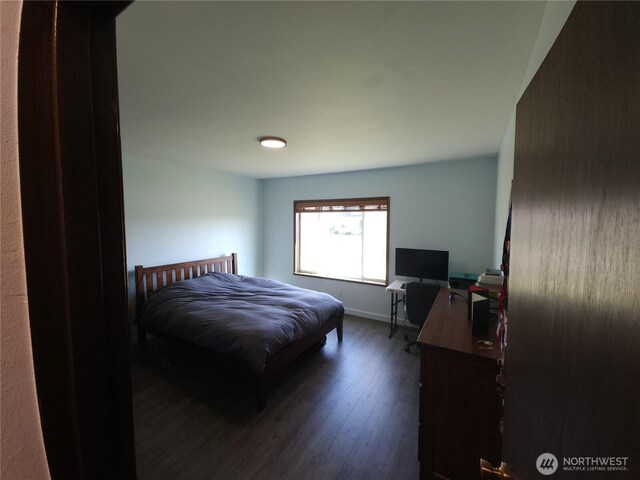 116 W 4th, Port Angeles, WA 98362 - bedroom with dark wood finished floors and baseboards